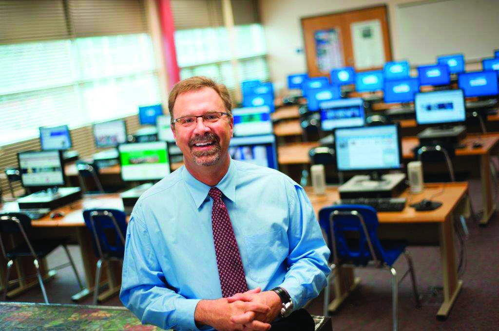 Janesville chief information officer Bob Smiley poses in a Janesville school classroom